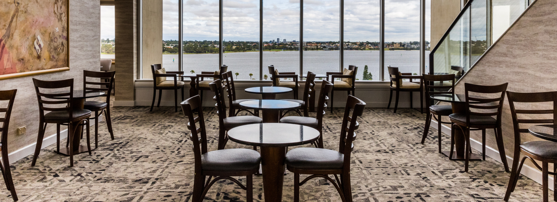 Elegant cafe overlooking serene waterfront