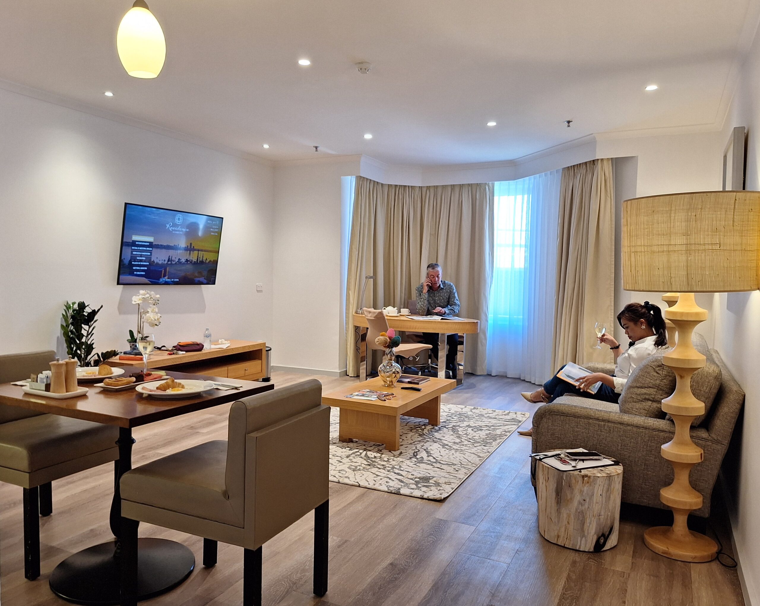 hotel suite with guests relaxing