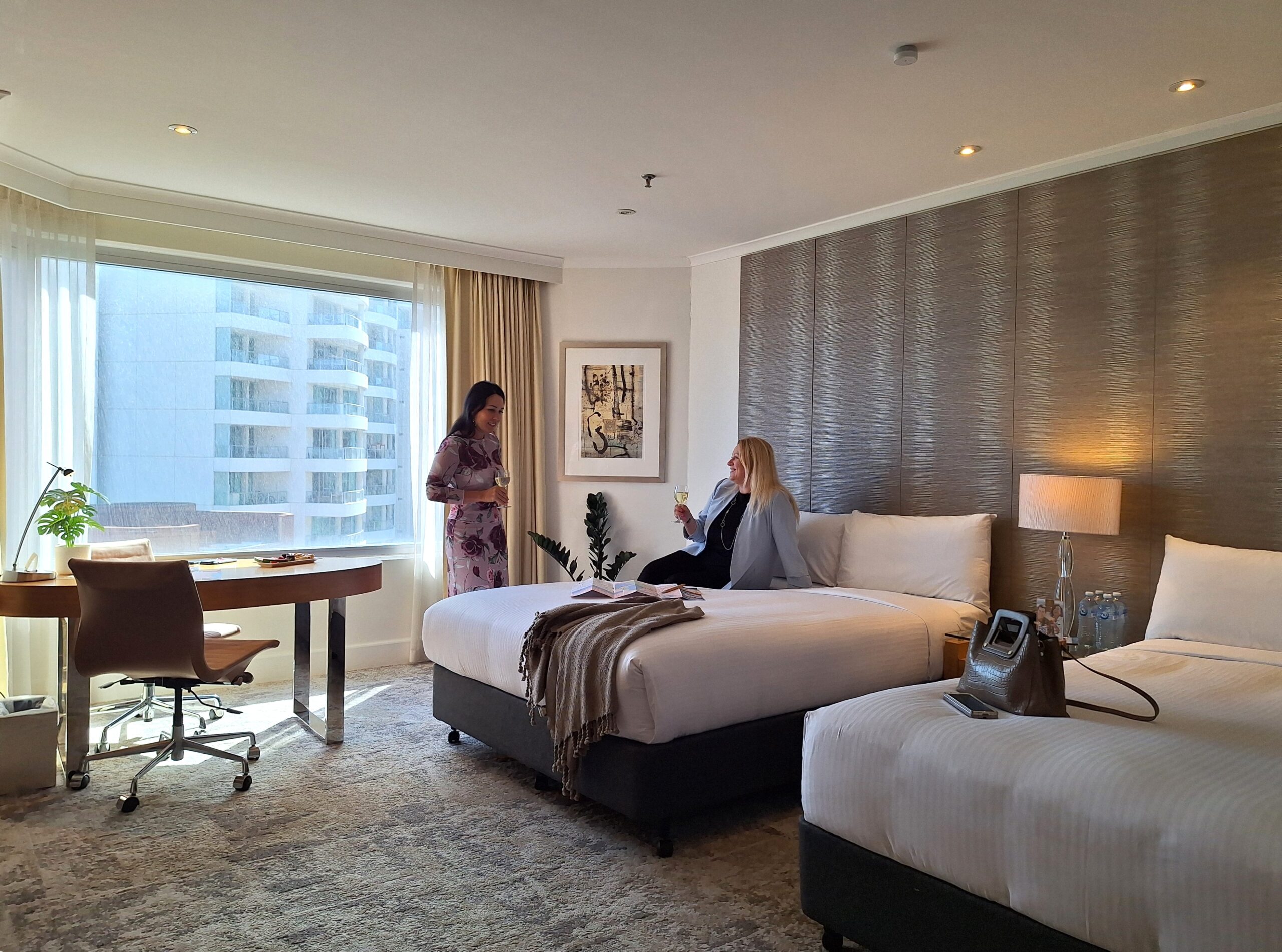 Modern hotel room with guests