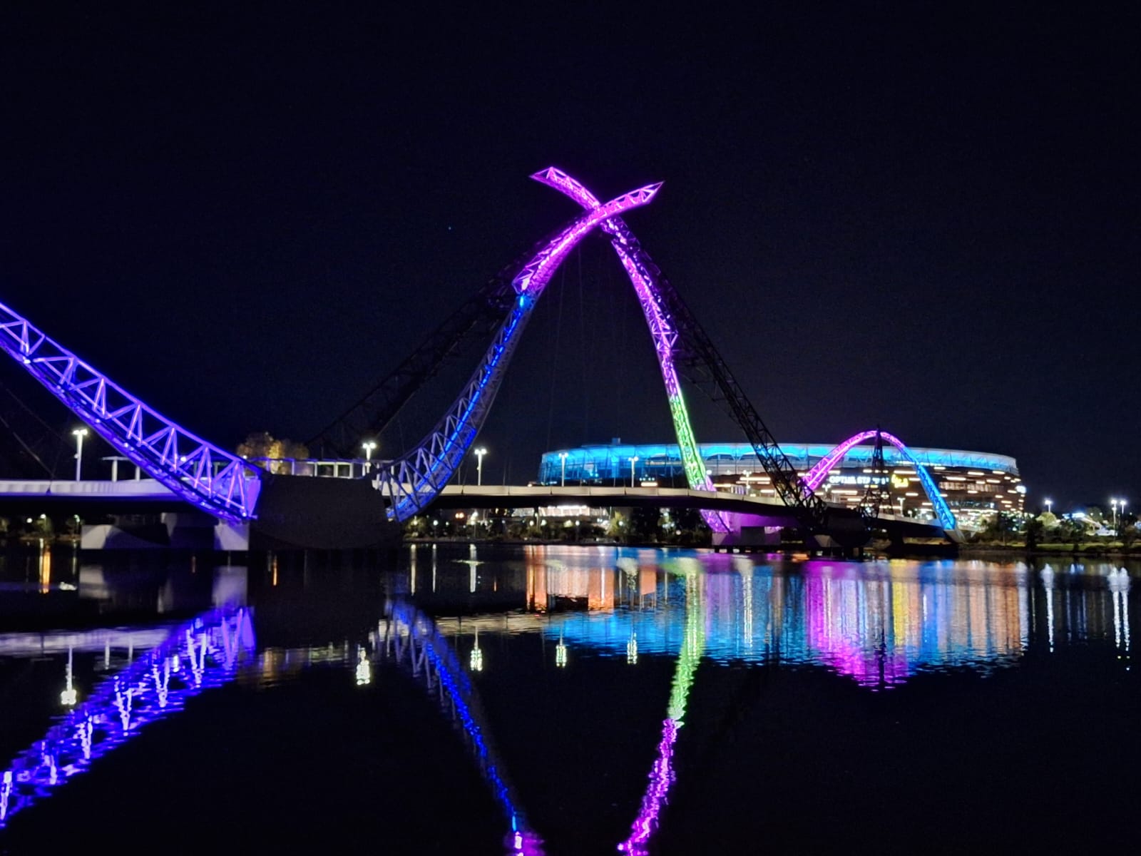 Illuminated bridge at night